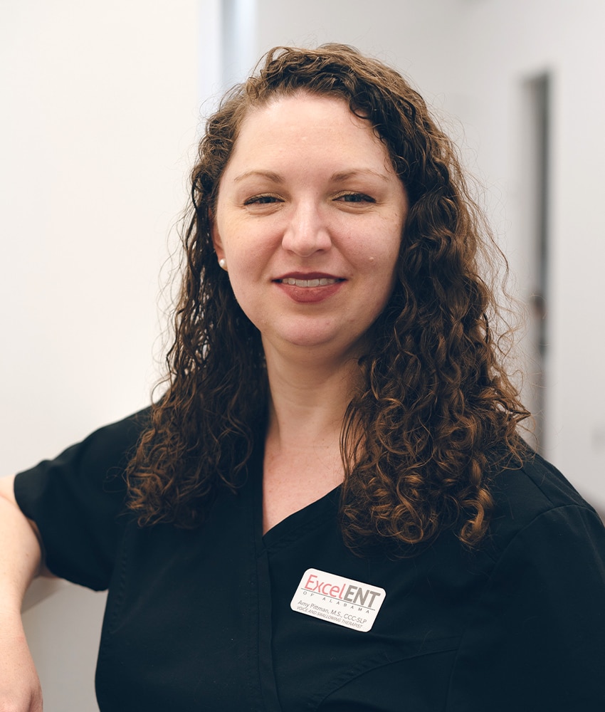 a woman smiling for the camera
