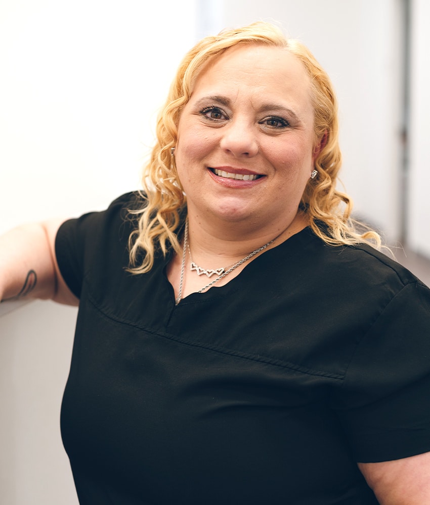 a woman smiling for the camera