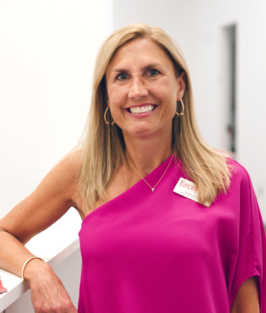 a woman wearing a purple shirt