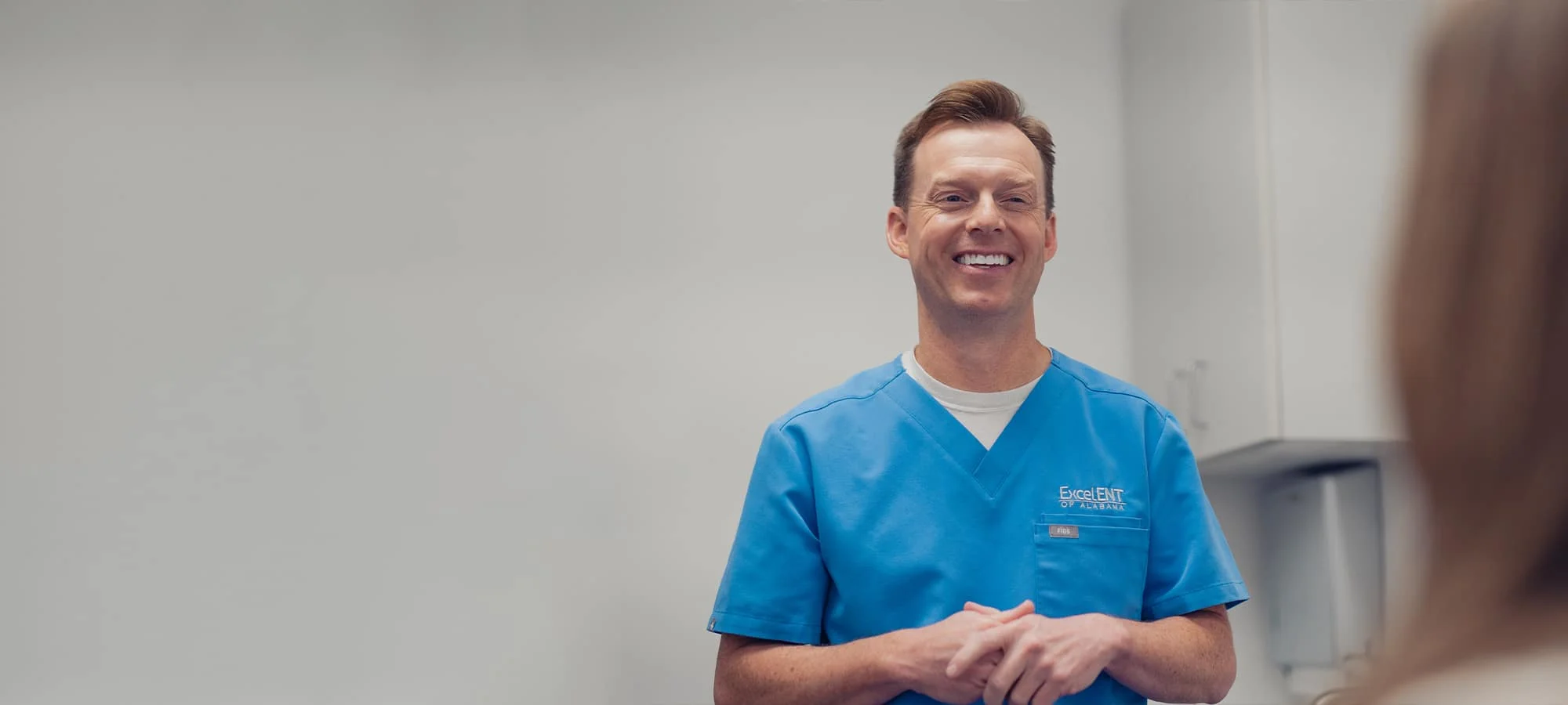 a man in a blue shirt